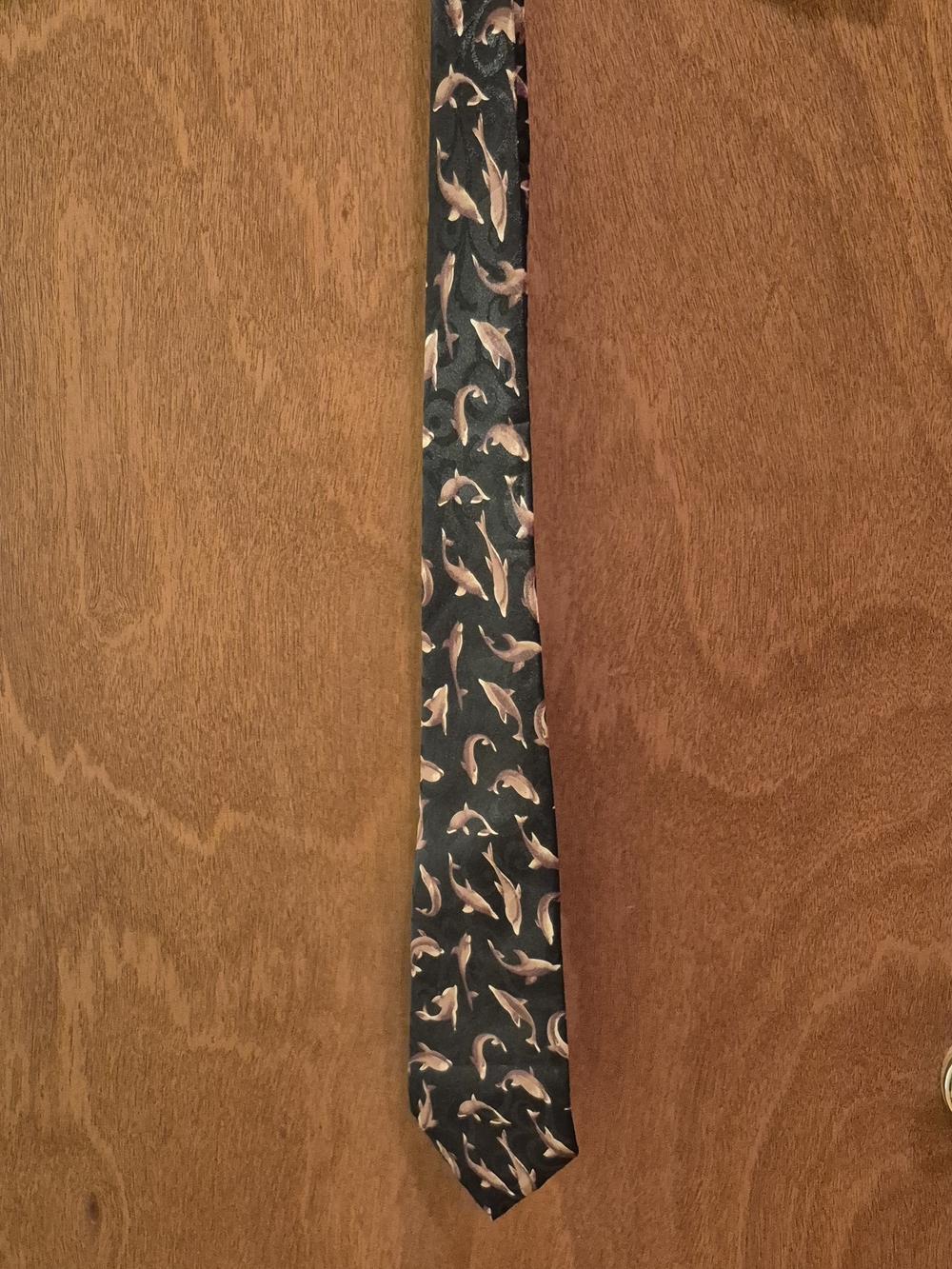 Black Tie with Subtle Light Brown Dolphin Motif